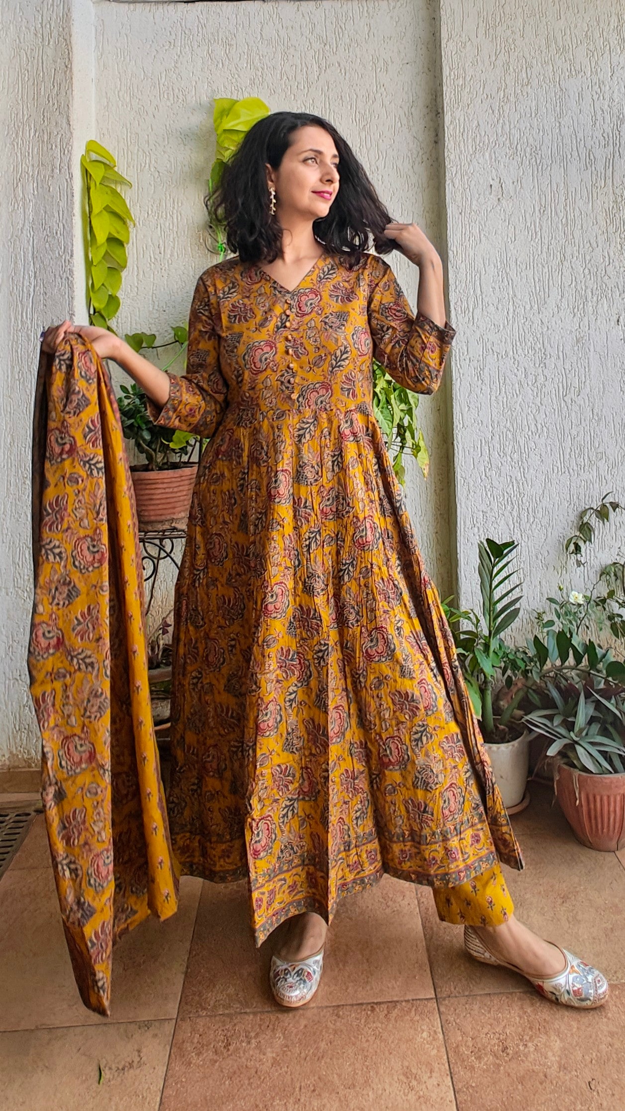 Mustard yellow Anarkali kurta set with dupatta